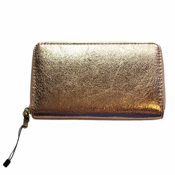 Urban Outfitters Handbags - Metallic foiled rosegold modern luxury casual wrap around zipper multi pocket